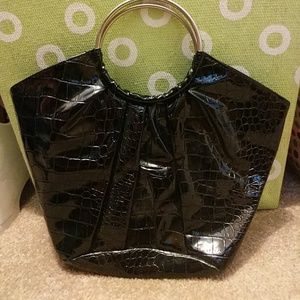 Faux leather clutch.